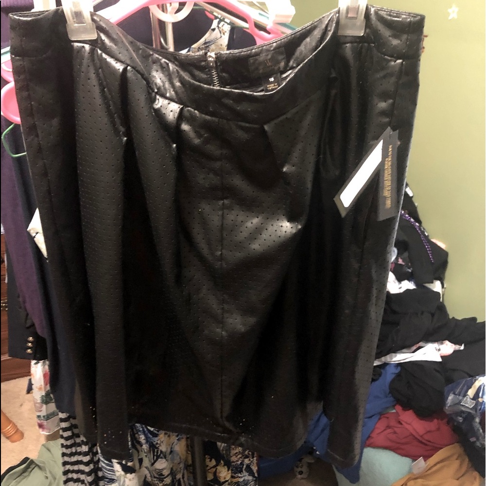 Black pleather skirt with zipper back. Size 16 by Worthington